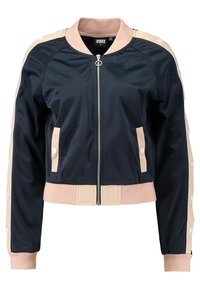 Mörkblå bomberjacka med beige ribbat krage, mudd och fåll, beige sidostripes med vita knappar, framtill dragkedja och knäppta fickor.