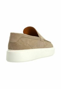 Beige suede slip-on shoes with a smooth texture, rubber white sole, rounded design, and minimal stitching detail on the upper.