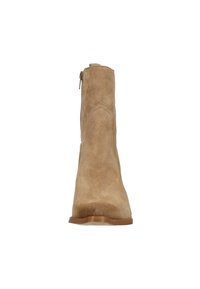 Tan suede ankle boot with a rounded toe, side zipper, and a smooth sole. Upper features a subtle stitched design.