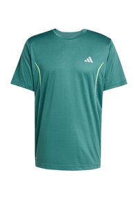T-shirt de sport teal fabriqué en tissu lisse et respirant. Équipé d'un col rond, de manches courtes et d'un logo blanc sur la poitrine avec des lignes d'accent.