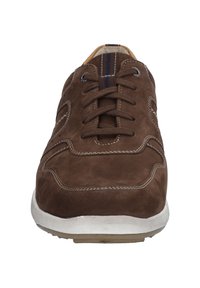 Brown suede sneaker with white rubber sole, round toe, and contrasting stitching. Features a navy striped accent at the top.
