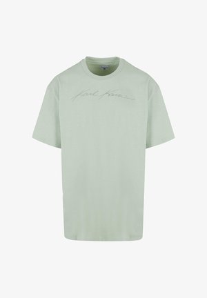 Hellgrünes T-Shirt mit kurzen Ärmeln aus weicher Baumwolle und Rundhalsausschnitt. Beinhaltet ein dezentes, strukturiertes Signaturlogo in einer kontrastierenden Farbe.