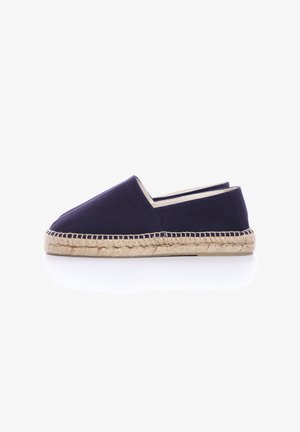 Espadrille en toile navy avec une semelle en corde de jute, présentant un bout arrondi et un design minimaliste. Aucune motif ou accent visible.