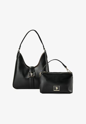 Deux sacs à main en cuir noir, un sac à bandoulière avec une fermeture carrée en métal, et une plus petite pochette zippée avec une poignée supérieure.
