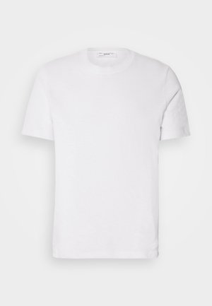 T-shirt bianco in cotone con scollo rotondo e maniche corte. Presenta un logo del marchio discreto sul davanti, una texture liscia e una vestibilità classica.