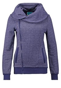 Sudadera con cremallera morada, con un gran cuello drapeado. Hecha de tejido texturizado, cuenta con bolsillos laterales y puños y dobladillo acanalados.