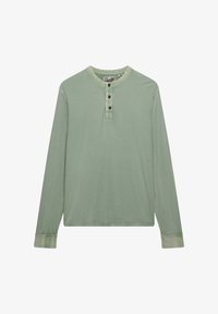 Seleccionado, pad green