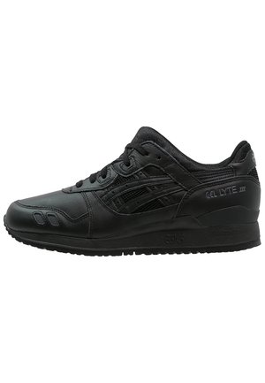 Schwarzer ASICS GEL-LYTE III Sneaker mit Schnürdesign, strukturierter Sohle und Markenlogo an der Seite und Ferse.