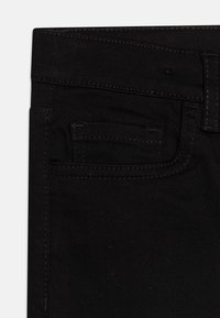 Lindex TROUSERS - Jeans a sigaretta - black