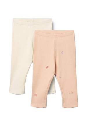 Dva páry žebrovaných dětských legín, jeden krémový a jeden světle broskvový s drobnými vyšívanými květinovými detaily roztroušenými na nohách.