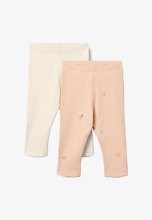 Due paia di leggings per neonati a coste, uno color crema e uno pesca chiaro, con piccoli dettagli floreali ricamati sparsi sulle gambe.