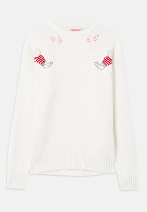 Witte gebreide trui met geborduurde figuren in rood en blauw. Ronde hals, geribbelde manchetten en onderrand. Zachte textuur, losse pasvorm.