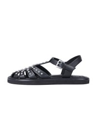 Sandalias de cuero negro con un diseño abierto, que cuentan con adornos de tachuelas y una correa ajustable en el tobillo para un ajuste seguro. Suela de goma.