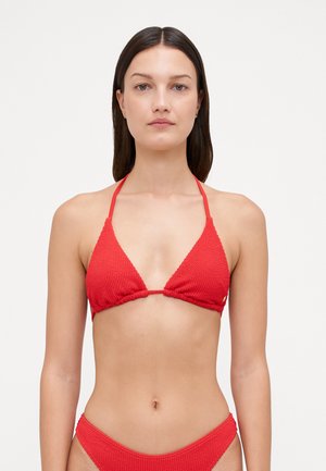 Red knitted bikini featuring a triangular top with thin straps and gathered sides; matching low-rise bottom without additional embellishments.