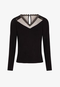 Top negro de manga larga con escote en forma de V, adornado con malla transparente de lunar y detalles de encaje. Cierre en el cuello en la parte trasera con un ribete decorativo.