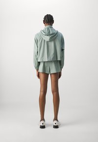 Girlfriend Collective TRAIL - Pantalón corto de deporte - chinoiserie