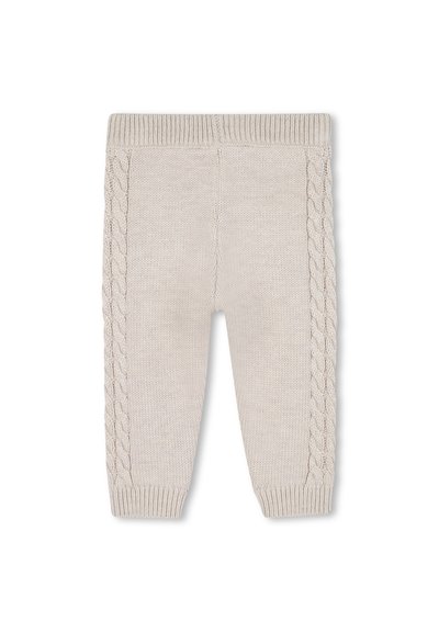 Leggings tricotés beiges clairs avec un motif en câble sur les côtés et des poignets côtelés, dotés d'une texture douce et d'une taille élastique.
