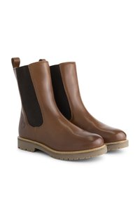 Stivali ankle in pelle marrone con pannelli elastici laterali, tessuto nero testurizzato e suola in gomma marrone chiaro. Fascette sul retro per una facile calzata.