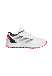 White athletic shoes with black accents, featuring a textured upper, prominent three stripes logo, and a red, traction-enhancing outsole.
