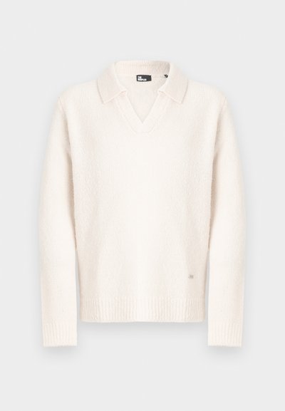 White sweater with a V-neck and a collar, made of soft textured material. Features ribbed cuffs and hem, with a small logo detail at the bottom.