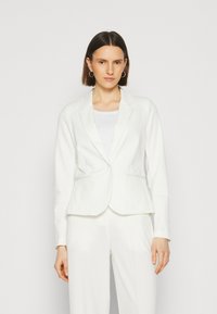 Weißer Blazer mit taillierter Silhouette, Ein-Knopf-Verschluss, Reverskragen und zwei seitlichen Taschen, aus glattem Stoff gefertigt.
