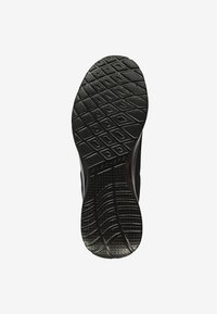 Schwarze Gummisohle mit einem strukturierten Muster aus Rauten und Linien für guten Halt. Inklusive geschwungener Kanten und dezenten Branding-Details.