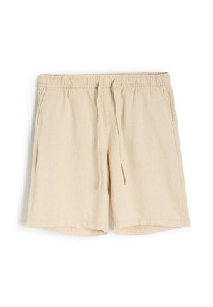 Beżowe lniane szorty z elastycznym pasem i sznurkiem, posiadające boczne kieszenie oraz luźny krój. Gładka tekstura, długość do kolan.