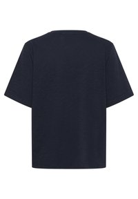 T-shirt en coton bleu marine à coupe décontractée, à manches courtes et décolleté rond. Il présente une texture lisse et ne comporte aucun motif ou graphique visible.