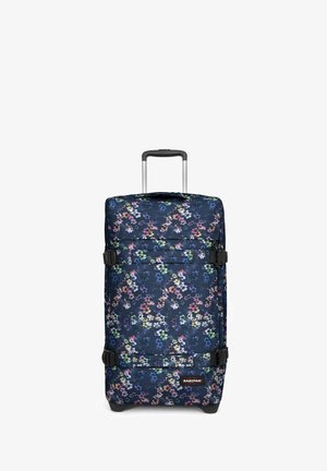 Sac à dos à roulettes en tissu durable, avec une base bleu marine ornée d'un motif floral en rose, violet et vert. Comprend des bretelles et des poignées réglables.