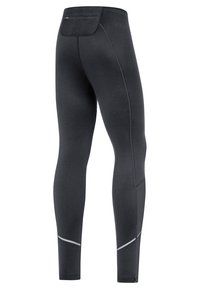 Leggings de sport noirs avec un design ajusté, fabriqués à partir d'un matériau extensible, comportant une poche arrière et des accents réfléchissants sur les côtés.