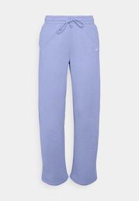 Lila Nike joggbukser med dragsnor i midjan og avslappet passform som vises mot hvit bakgrunn.