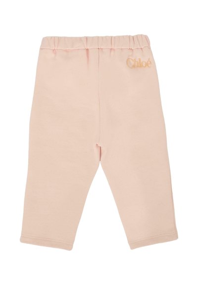 Pantaloni della tuta rosa chiaro con cintura elastica, dotati di un piccolo logo "Chloé" in rilievo sul lato sinistro. Tessuto di cotone morbido, design aderente.
