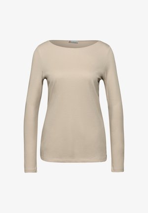 Béžový top s dlouhým rukávem a širokým výstřihem. Vyrobeno z měkké tkaniny, má úzký střih a zakončené manžety. Bez vzorů nebo ozdob.