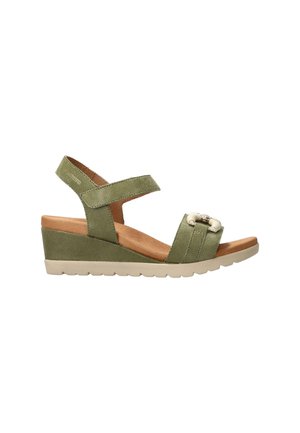 Sandale compensée vert olive avec bride de cheville ajustable, première de propreté rembourrée beige et détail décoratif de perles sur la bride à l'avant.