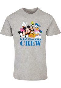 Camiseta gris de manga corta con personajes de dibujos animados coloridos y el texto "Disney CREW" en azul en la parte inferior.