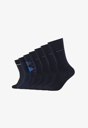 Sæt af syv par marineblå strømper. Inkluderer ensfarvede, stribede, prikkede og argyle-mønstre. Lavet af blødt materiale med forstærkede tåer.