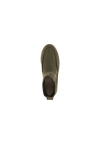 Bottines en suede vertes avec des panneaux élastiques sur les côtés, bout rond et semelle texturée. Elles disposent d'une bande de tirage pour un enfilage facile.