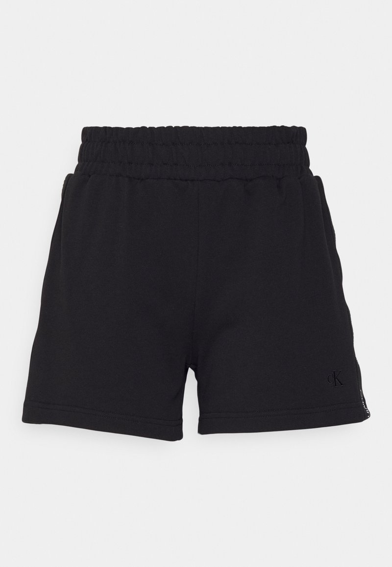 Pantaloni corti in cotone nero con cintura elastica, caratterizzati da un piccolo logo laterale e una superficie liscia. Design semplice, taglio fino al ginocchio.