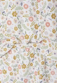 Floral patterned fabric in pastel colors with pink, yellow, and green flowers on a white background; soft, plush texture.