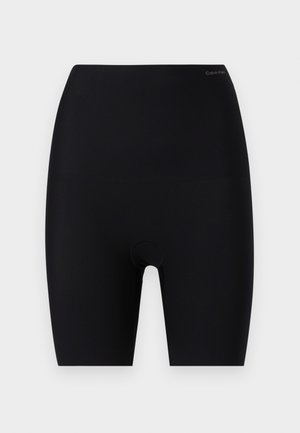 Μαύρα seamless biker shorts με ψηλή μέση, μήκος μέχρι τη μέση του μηρού και μικρό λογότυπο "Calvin Klein" στο πάνω δεξί μέρος της μέσης.
