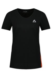 Black short-sleeve t-shirt with a round neckline, featuring a small white logo on the chest and an orange accent on the side. Cotton material.