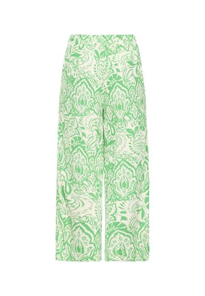 Laiade säärega püksid elastse vöökoha ja valge taustaga, millel on roheline keerukas lille- ja paisleimuster.