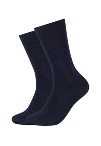 Marineblå sokker lavet af et glat, blødt materiale. De har et klassisk design med en ribbet kant og en sømløs tå for komfort.