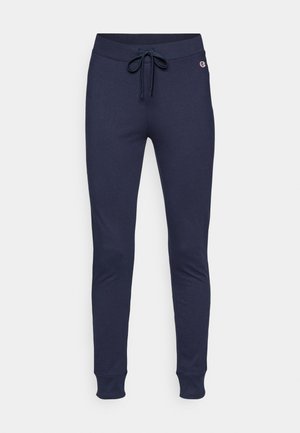 Pantalons de survêtement bleu marine avec une taille à cordon, des jambes fuselées et des poignets côtelés. Fabriqués en tissu doux et extensible, portant un petit logo sur la hanche.