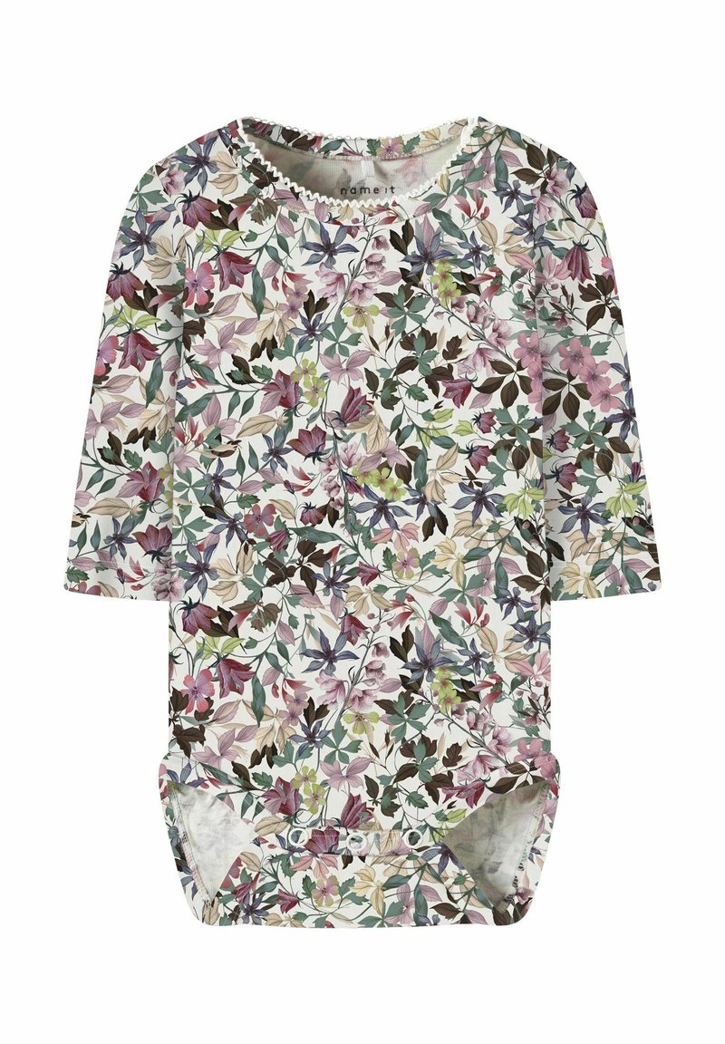 Bloemige romper met lange mouwen, met een crèmekleurige achtergrond en multikleuren bloemen- en bladerenpatronen. Drukknoopsluiting aan de onderkant.