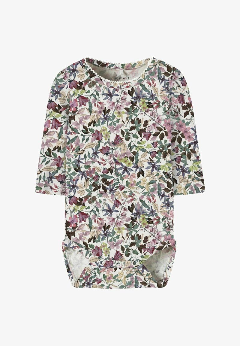 Bloemige romper met lange mouwen, met een crèmekleurige achtergrond en multikleuren bloemen- en bladerenpatronen. Drukknoopsluiting aan de onderkant.