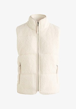 Cremefarvet fleecevest med høj krave, lynlås foran og sidelommer. Har en tekstureret, blød overflade og et puffet quiltet design.