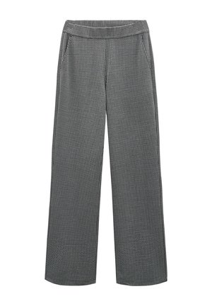 Wijduitlopende broek gemaakt van zwart-wit textiel, met een subtiel patroon, voorzakken en een elastische tailleband.