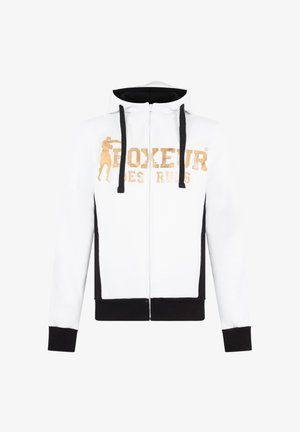 Weiße Zip-Hoodie mit schwarzen Akzenten, ausgestattet mit einem goldenen "BOXEUR DES RUES" Graphic und einer Boxersilhouette. Weicher Stoff, Kapuze mit Kordelzug.