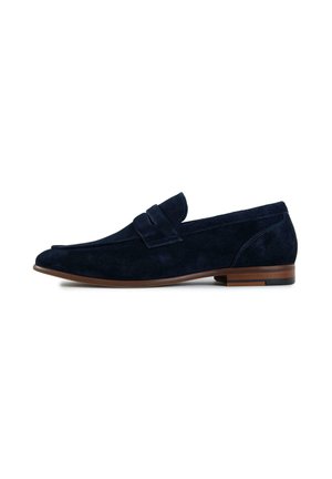 Navy blue suede men's loafer with flat wooden heel and strap detail across the top, shown from the side on a white background.